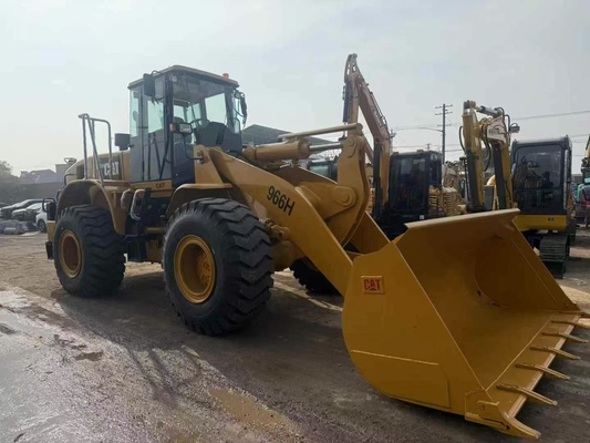 Chargeuse sur pneus Caterpillar 966H d'origine japonaise d'occasion, neuve à 90%, charge nominale 6 tonnes, machines de terrassement et de génie civil de haute qualité.